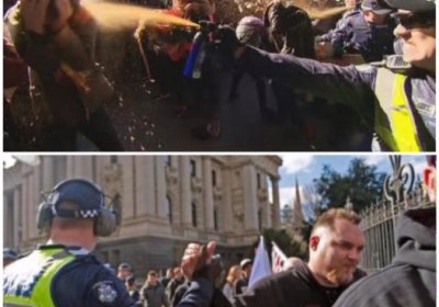 Police pepper spray anti-racist protesters, while cavorting with fascists. Melbourne, July 18.