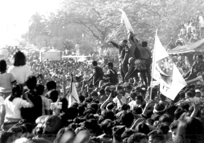 Anti-dictatorship forces celebrate in EDSA after President Ferdinand Marcos was ousted, 1986.