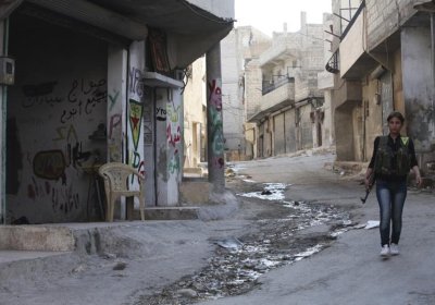 Kurdish fighter in Aleppo's Sheikh Maqsoud neighbourhood.