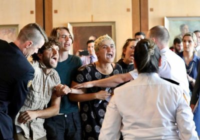 Refugee rights protesters in Parliament on November 30.