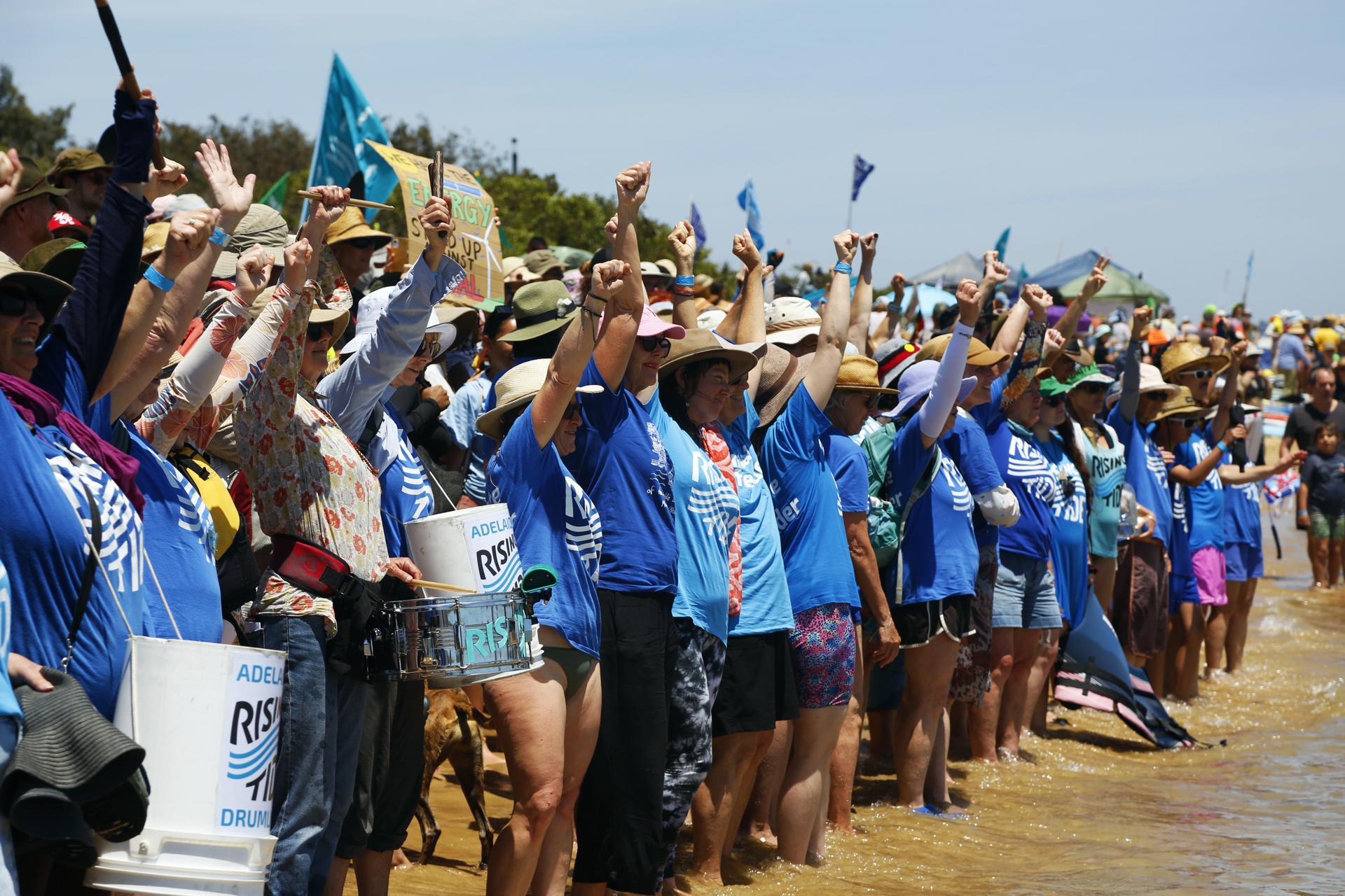 Supporters on the beach, cheering that the coal ship was turned around