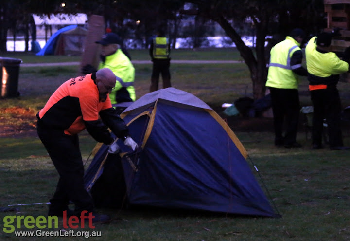 The rain was still gently falling as they began to seize tents, bedding, food and other equipment.